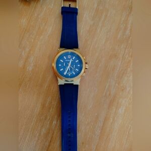 Mk 8295 Rose Gold with blue rubber band